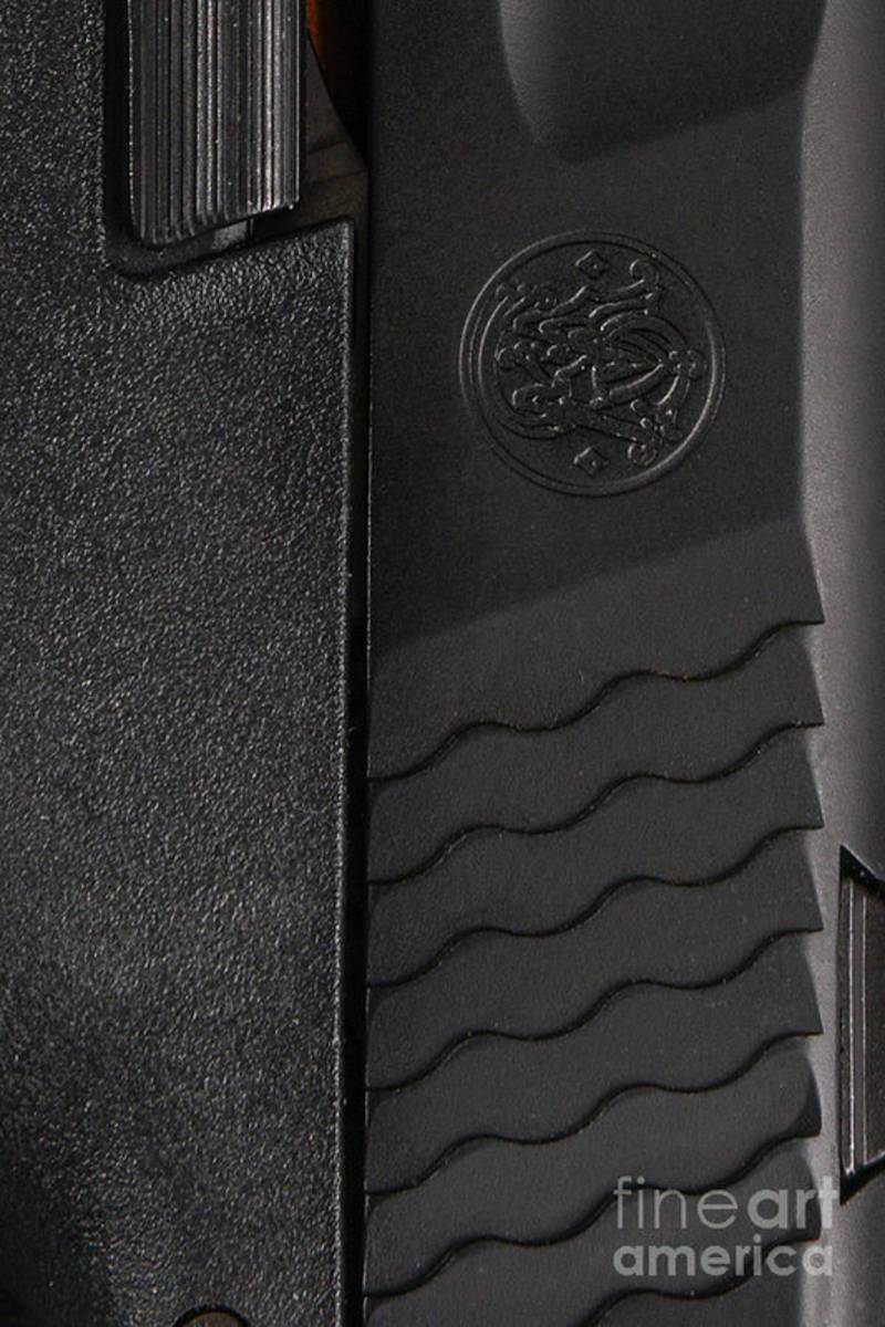 Closeup Of Smith And Wesson Shield - Poster | Canvas Wall Art Print