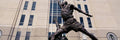 Low Angle View Of A Statue In Front - Poster | Canvas Wall Art Print
