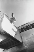A Male Model Disembarking A Twa Boeing 707 Plane - Poster | Canvas Wall Art Print