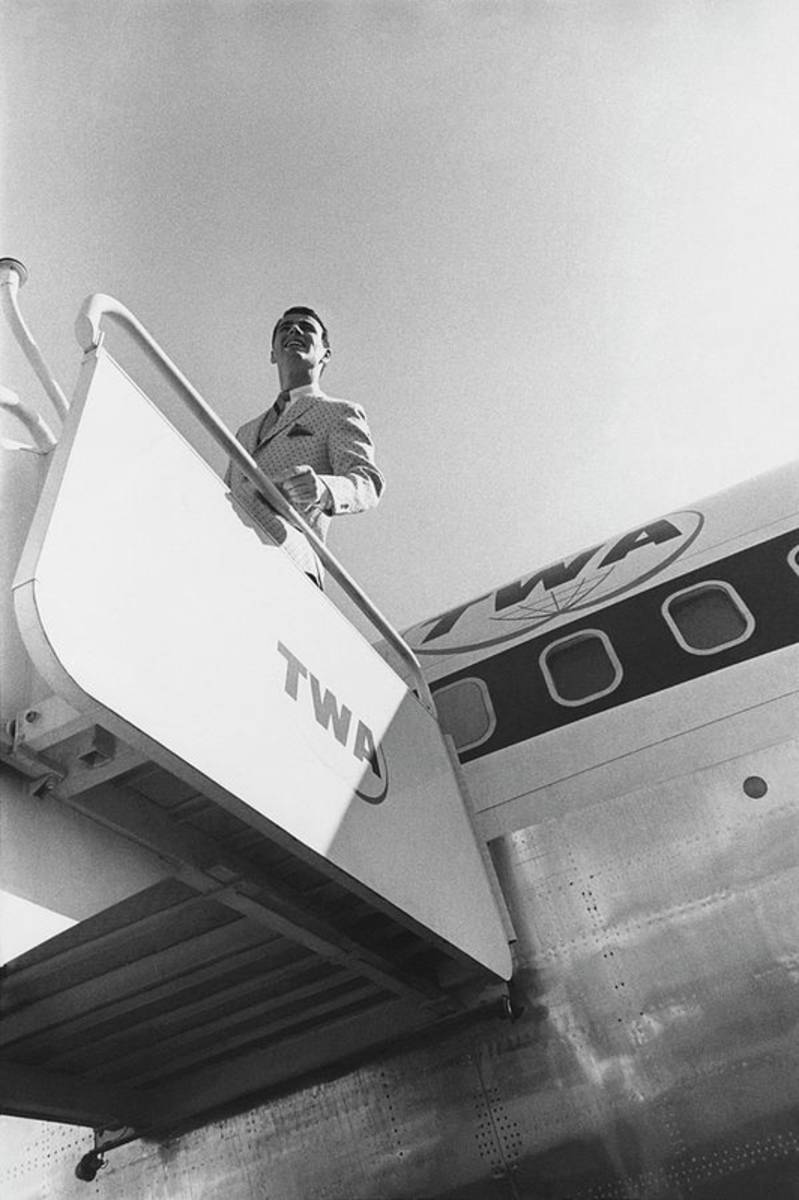 A Male Model Disembarking A Twa Boeing 707 Plane - Poster | Canvas Wall Art Print