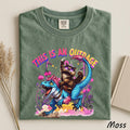 This is an Outrage TShirt Princess Donut and Mongo Top Dungeon Crawler Carl Shirt Cat Lover TshirtDinosaur Graphic Tee